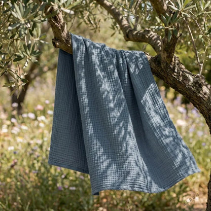 Mousselia™ – La couverture en mousseline de coton qui vous enveloppe de douceur