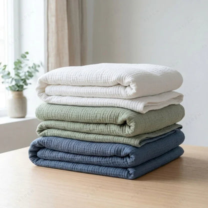 Mousselia™ – La couverture en mousseline de coton qui vous enveloppe de douceur