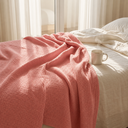 Mousselia™ – La couverture en mousseline de coton qui vous enveloppe de douceur
